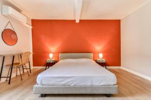 Postel nebo postele na pokoji v ubytování L'Émeraude de la Cité - Quai Bellevue - Proche Cité - Clim - Netflix