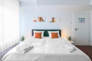 Postel nebo postele na pokoji v ubytování Hotel Kleiner Markt