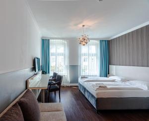 Postel nebo postele na pokoji v ubytování Hotel Prens Berlin