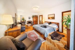 Postel nebo postele na pokoji v ubytování Apartments Dlouhá 93