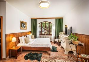 Postel nebo postele na pokoji v ubytování Apartments Dlouhá 93