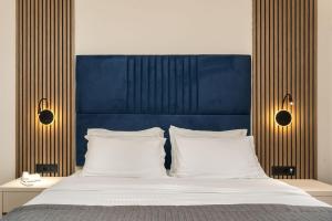 Postel nebo postele na pokoji v ubytování Palatino Hotel