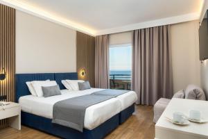 Postel nebo postele na pokoji v ubytování Palatino Hotel