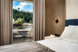Postel nebo postele na pokoji v ubytování Palatino Hotel
