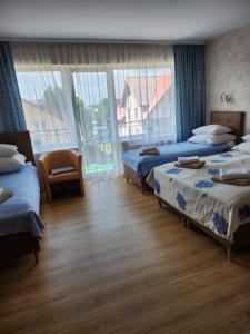 Posteľ alebo postele v izbe v ubytovaní Willa Magnolia