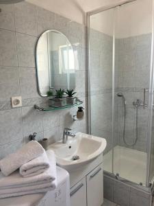 Koupelna v ubytování Apartments Curnić