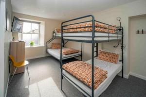 Voodi või voodid majutusasutuse Newcastleton Bunkhouse toas
