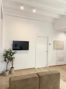 Vigablanca Apartments的电视和/或娱乐中心