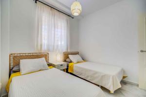 Ένα ή περισσότερα κρεβάτια σε δωμάτιο στο Beach View Challenge +31 φωτογραφίες