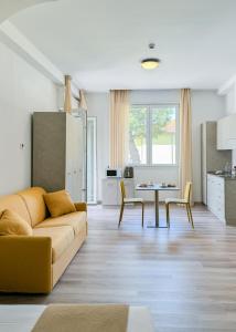Kuchyň nebo kuchyňský kout v ubytování Nido Suite & Apartments