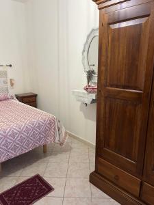 Postel nebo postele na pokoji v ubytování Cantina&Agriturismo Canu