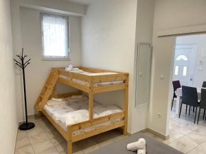 Postel nebo postele na pokoji v ubytování Apartments Coric