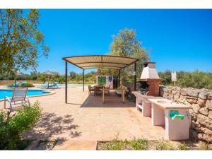 The swimming pool at or close to Holiday Home Can Soler by Interhome