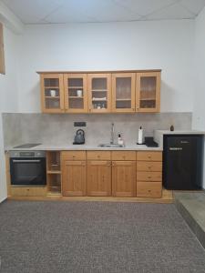 A cozinha ou kitchenette de Apartmány Štěpánkova 85