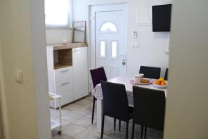 Kuchyň nebo kuchyňský kout v ubytování Apartments Coric