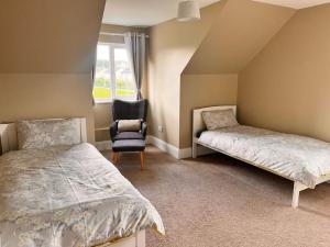 Voodi või voodid majutusasutuse Spacious 4 BR, Perfect Location toas