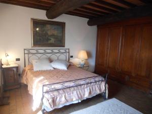Postel nebo postele na pokoji v ubytování La Pieve Di Sant'Andrea