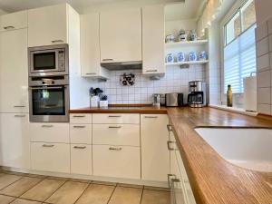 Köök või kööginurk majutusasutuses Ferienhaus Ostseekind Karlshagen +15 fotot