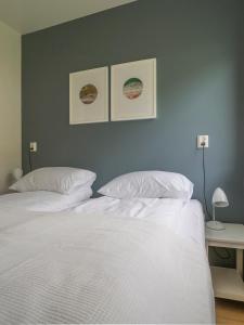Seydisfjördur Guesthouseにあるベッド