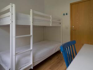 Seydisfjördur Guesthouseにあるベッド