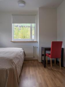 Seydisfjördur Guesthouseにあるベッド