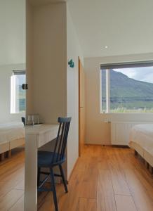 Seydisfjördur Guesthouseにあるベッド