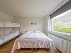 Seydisfjördur Guesthouseにあるベッド