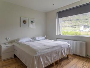 Seydisfjördur Guesthouseにあるベッド