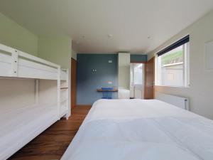 Seydisfjördur Guesthouseにあるベッド