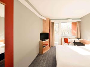 Posteľ alebo postele v izbe v ubytovaní Ibis Budapest Citysouth