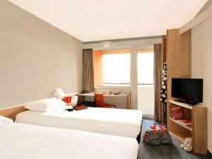 Posteľ alebo postele v izbe v ubytovaní Ibis Budapest Citysouth