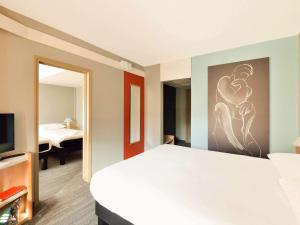 Posteľ alebo postele v izbe v ubytovaní Ibis Budapest Citysouth