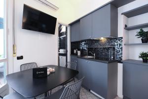 Η κουζίνα ή μικρή κουζίνα στο Duomo Terrace Suite