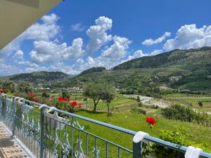 a view of the hills from the balcony of a house at Vila Ardea in Berat