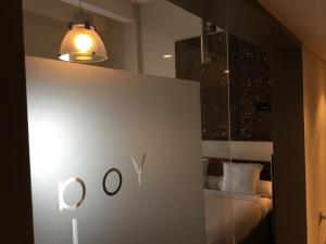 A bed or beds in a room at B&B Wellness Yoake