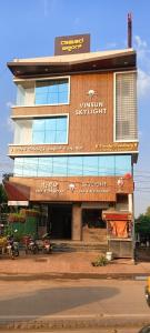 a building on the side of a street at Varaha Residency Lodging and Banquet in Hubli