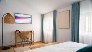 Postel nebo postele na pokoji v ubytování Hôtel Le Ribéral