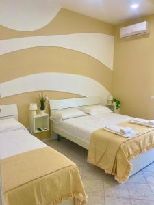 A bed or beds in a room at Terrazza Garibaldi