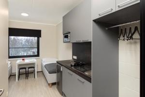 Kuchyň nebo kuchyňský kout v ubytování Reti tee 11 külaliskorterid