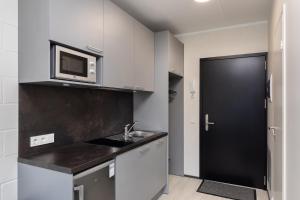 Kuchyň nebo kuchyňský kout v ubytování Reti tee 11 külaliskorterid