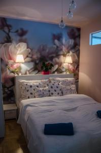 Llit o llits en una habitació de Blue Luxury Apartment