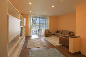 TV a/nebo společenská místnost v ubytování Amami al Crescent