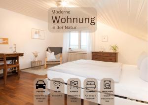 a bedroom with a bed and a sign that reads moroccan wolfuing in at Moderne Ferienwohnung in der Natur - 3 Schlafzimmer & 1,5 Bäder in Markdorf