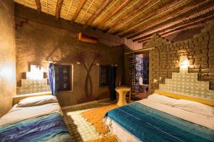 Cama o camas de una habitación en Kasbah Panorama