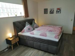 Cama ou camas em um quarto em Haus Sommerberg
