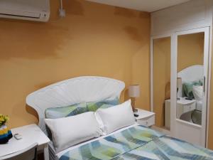 Katil atau katil-katil dalam bilik di Argalo Suites 1