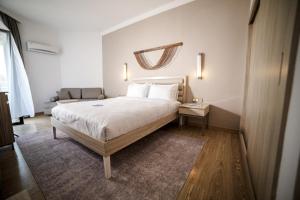 Кровать или кровати в номере Fun & Sun Club Saphire