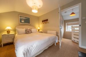 Voodi või voodid majutusasutuse Carpenters Cottage toas