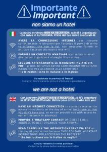 a poster for an emergency department with the words not a hotel at B&B Trento - Only self check-in in Trento
