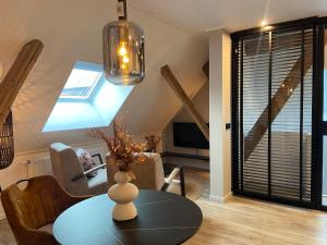 Posezení v ubytování B&B Kuiper in Friesland